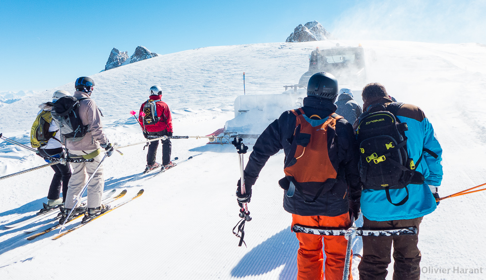 Towed by the Les 2 Alpes snow groomer, heading for La Grave!